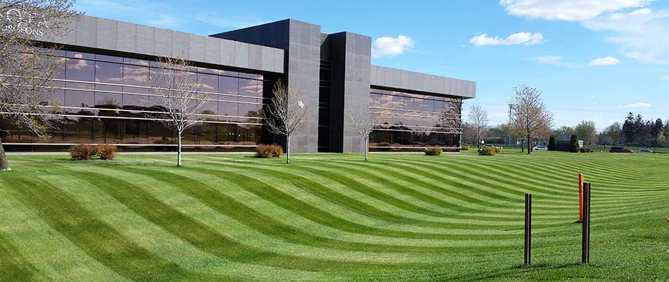 Striped lawn at a modern commercial office property